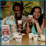 Magazine ad featuring Luv Ya Blue with Kenny and Adrian Burrough in a Carnation Milk ad